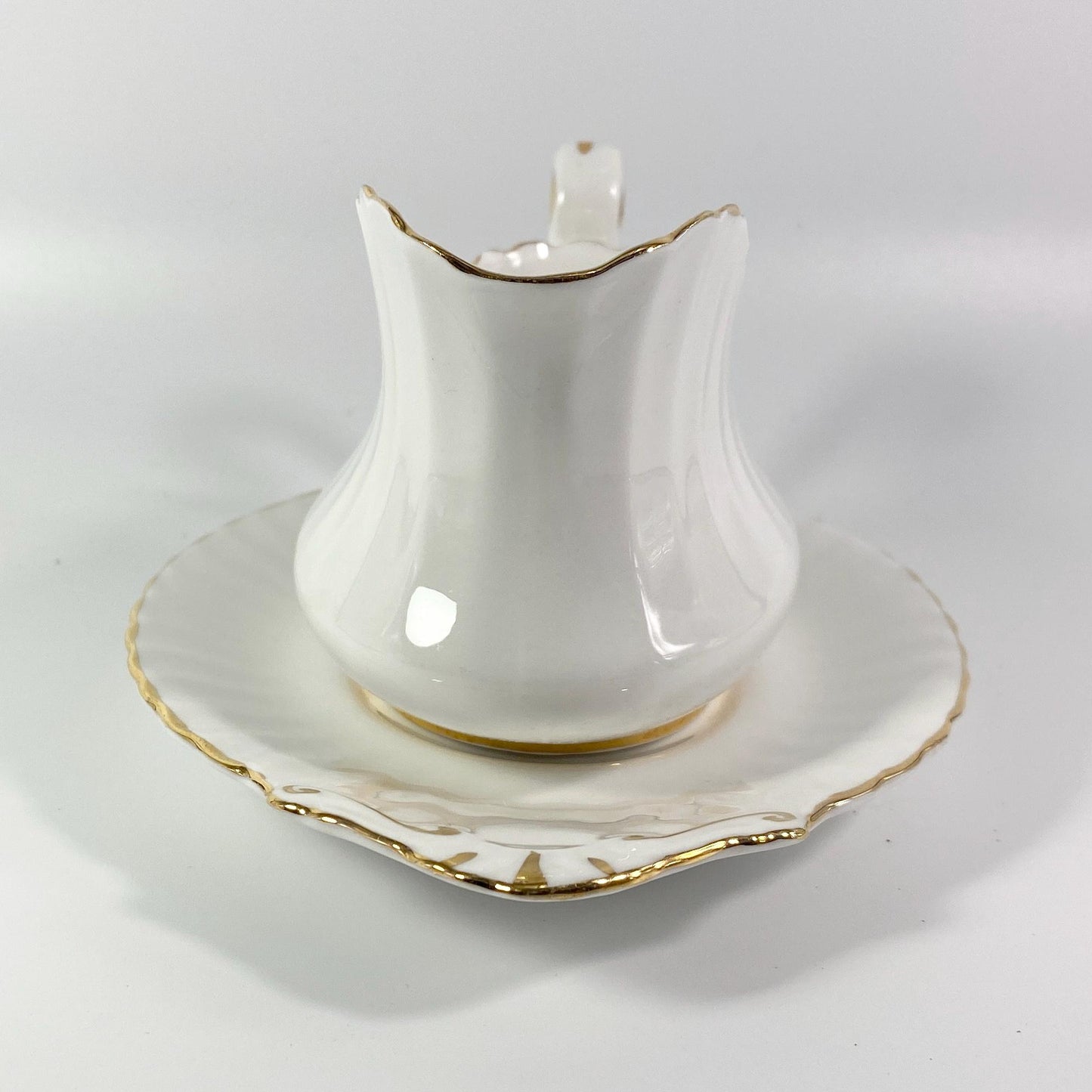 Paragon Gravy or Sauce Boat with plate,  White with gold Trim vintage England