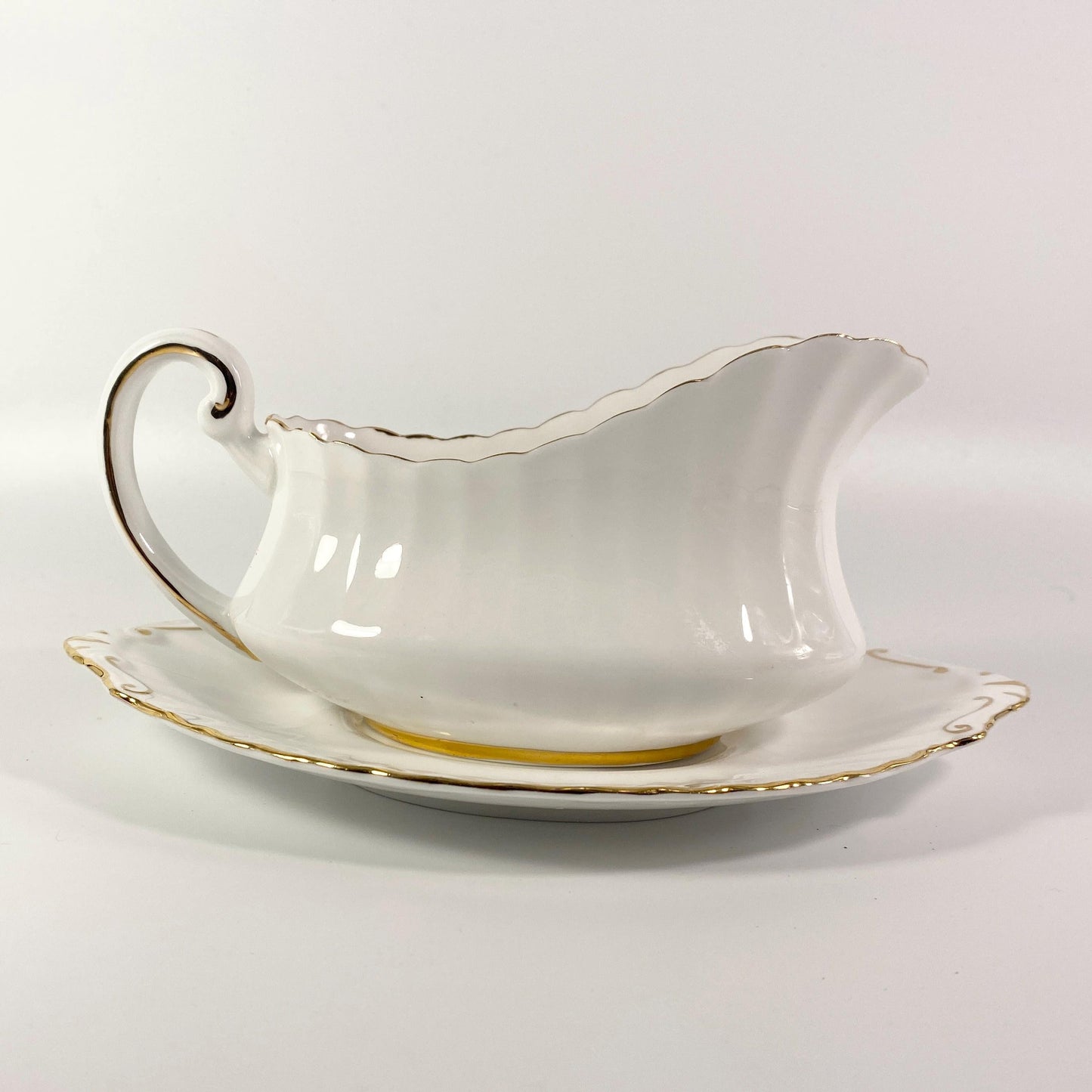 Paragon Gravy or Sauce Boat with plate,  White with gold Trim vintage England