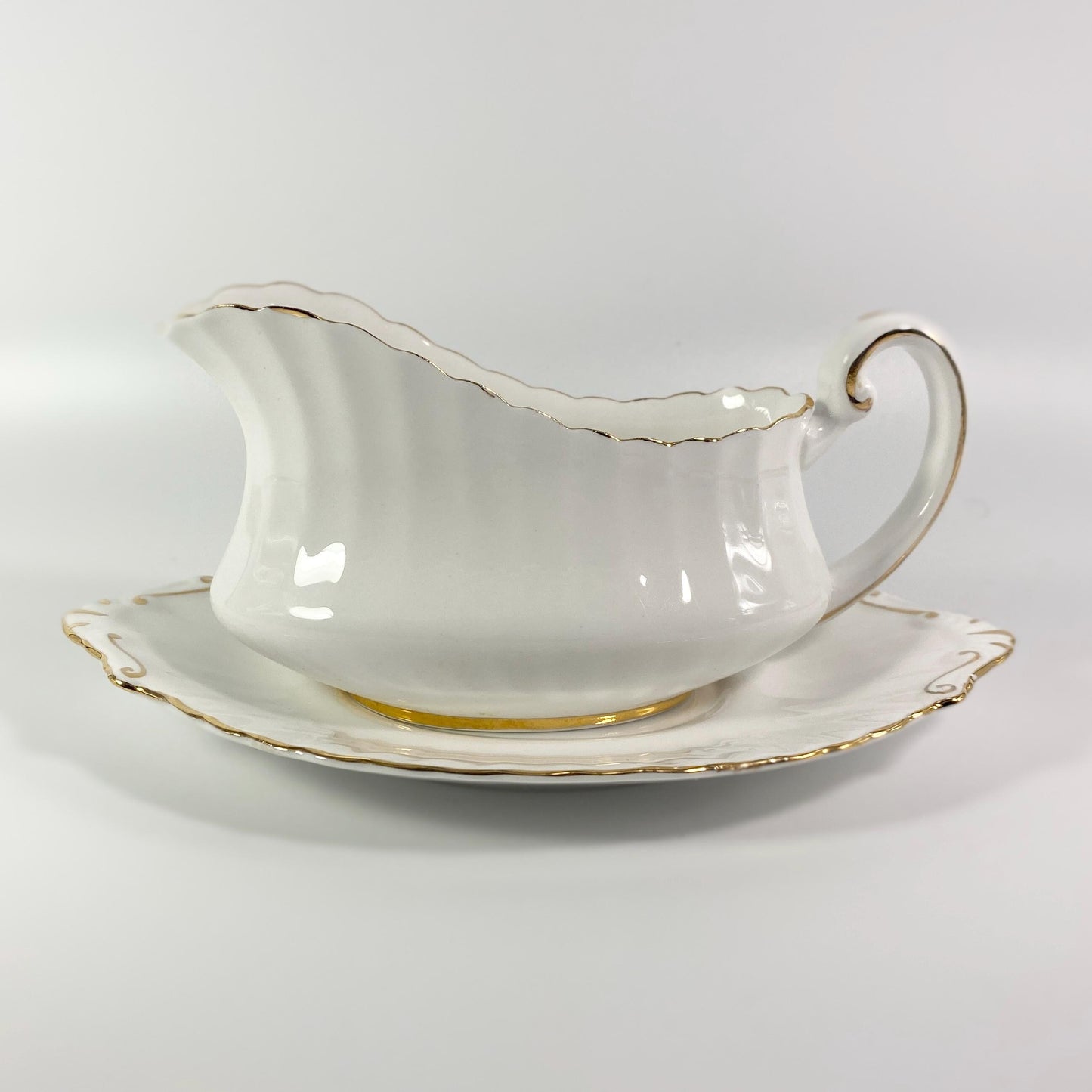 Paragon Gravy or Sauce Boat with plate,  White with gold Trim vintage England