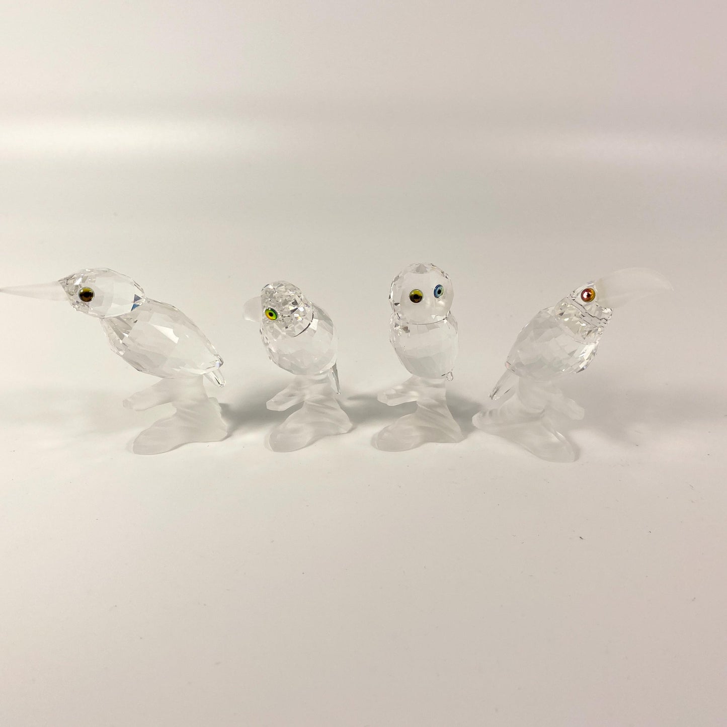Swarovski Parrot  Kingfisher Toucan and Owl  up in the trees set with Box & CoA