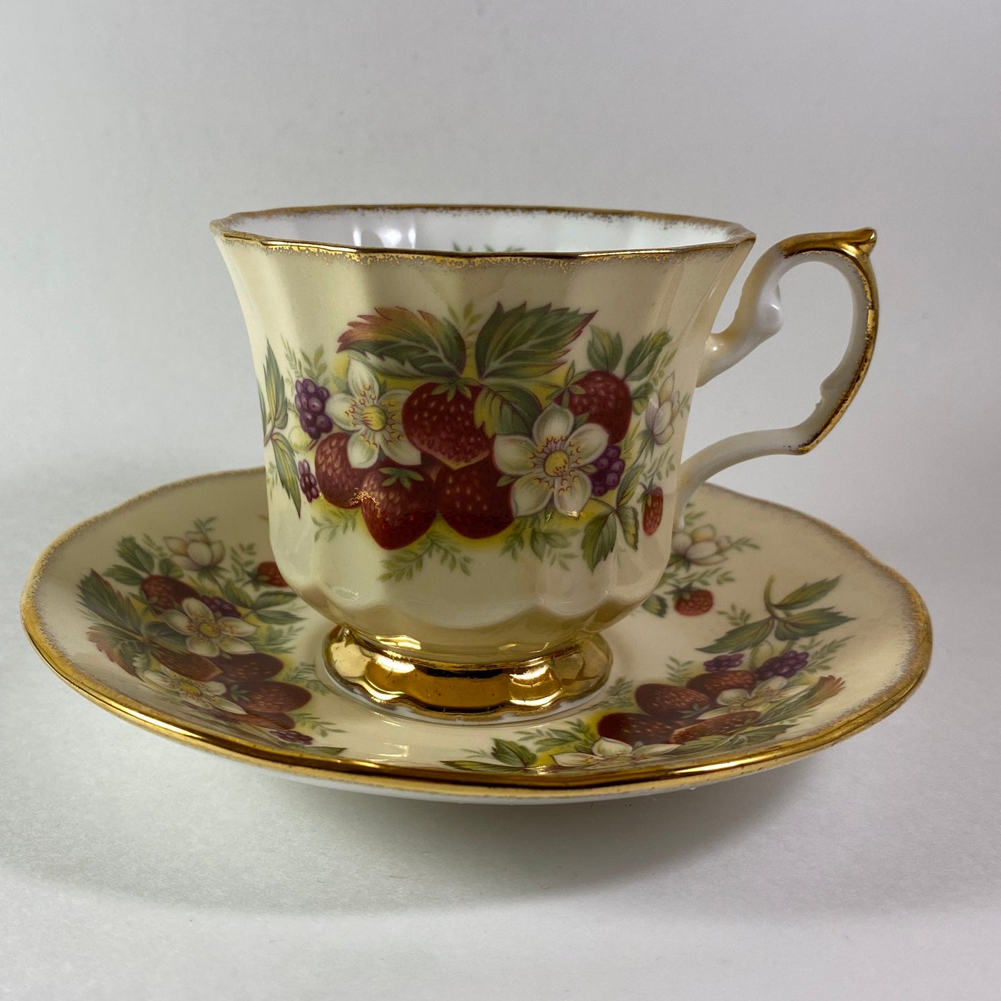 Beautiful Vintage Elizabethan Strawberry design yellow teacup and saucer