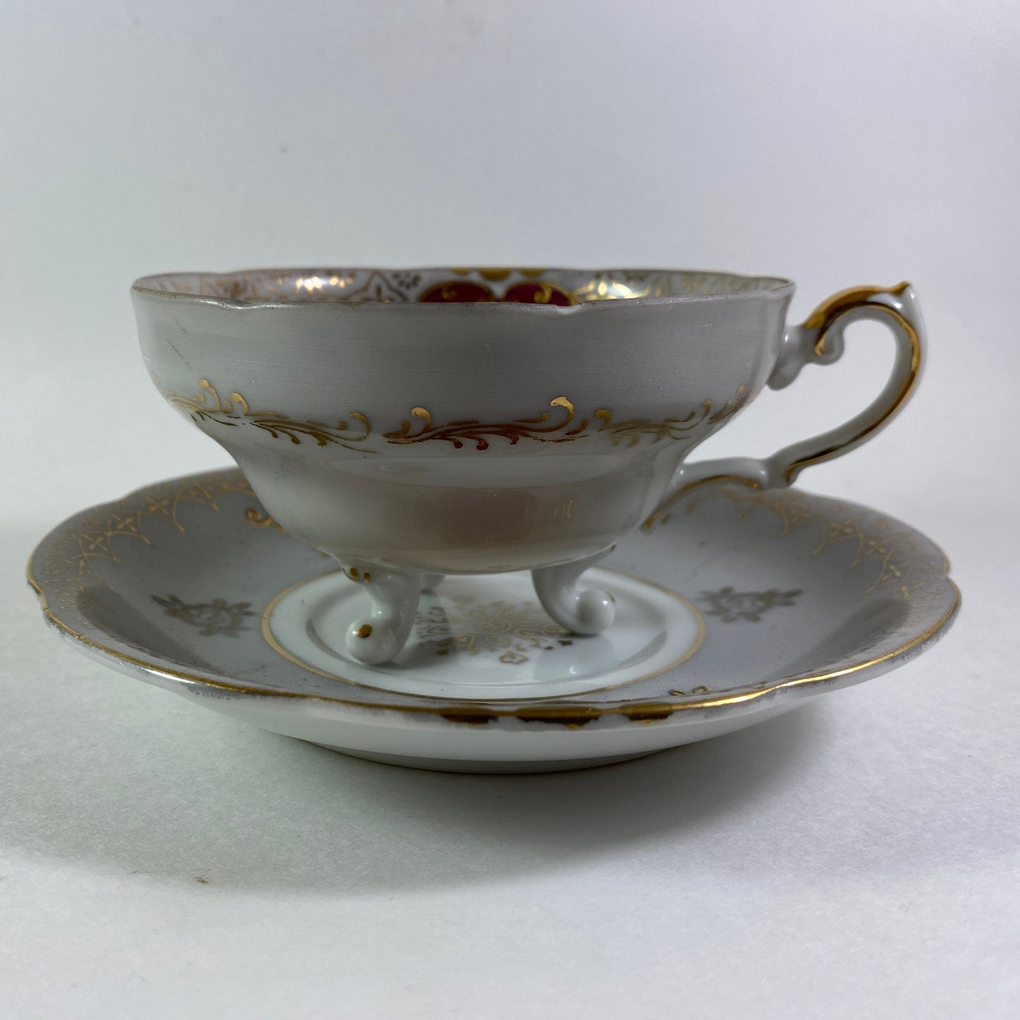 Stunning Vintage Shafford Japan 3 footed hand painted teacup and saucer